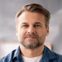 bearded-smiling-engineer-with-arms-crossed-on-LF5QXBS.jpg
